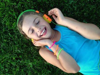 Young girl enjoying music